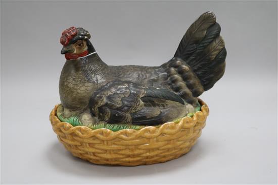 A Continental porcelain hen basket and cover